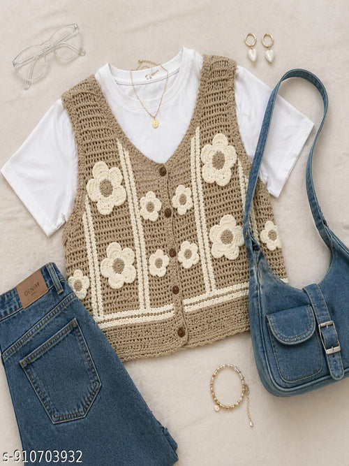 Floral-patterned vest with white shirt, blue jeans, and denim bag on a light background